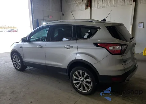 2018 Ford Escape Titanium z USA, uszkodzony, nr VIN 1FMCU9J95JUB54051